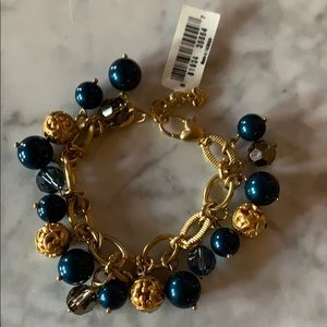Brighton gold colored bracelet w/blue & gold beads